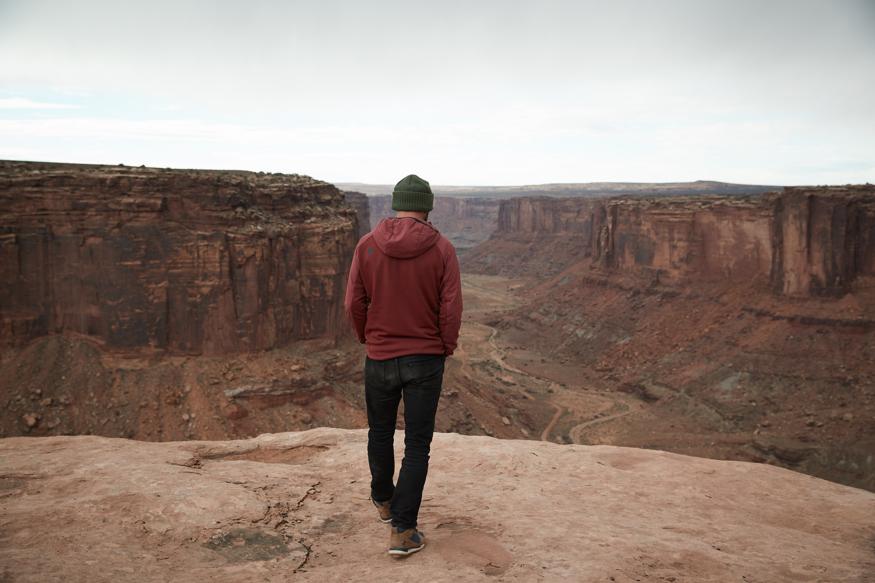 Man Standing on the Rocks